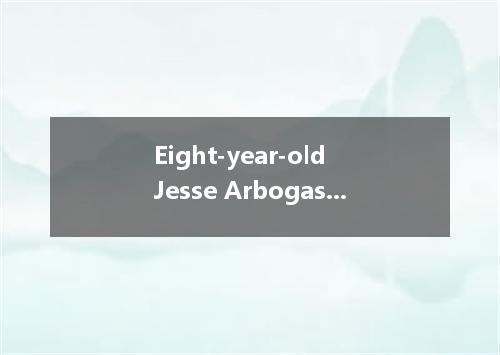 Eight-year-old Jesse Arbogast was playing in the sea late one evening in July wh